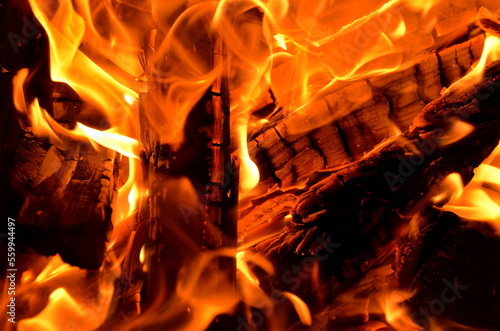 Bright graphic resource consists of texture of burning wood and flame.