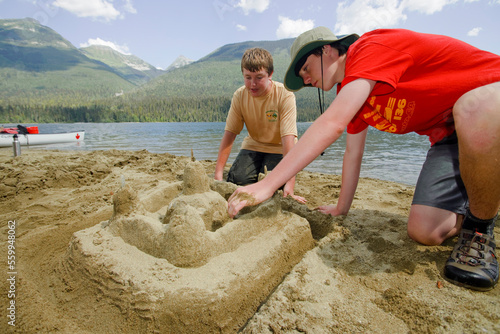 Boy Scouts canoeing on the Bowron Lakes circuit. Bowron Lakes Provincial Park. Quesnel, British Columbia photo