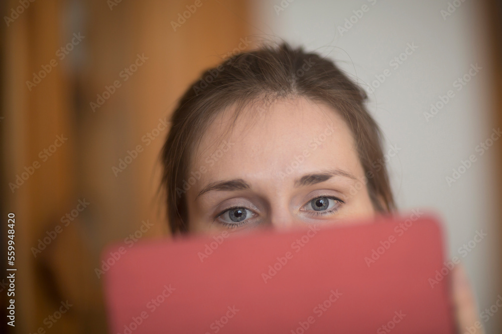 Young woman working on a digital tablet, Freiburg im Breisgau, Baden-Württemberg, Germany Young woman working on a digital tablet, Freiburg im Breisgau, Baden-Württemberg, Germany