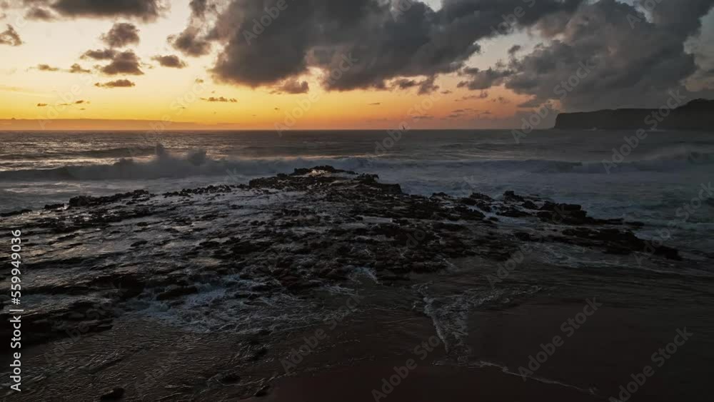 Surfs up sunrise at the seaside with scattered clouds at North Avoca, Central Coast, NSW, Australia. Surfs up sunrise at the seaside with scattered clouds at North Avoca, Central Coast, NSW, Australia.