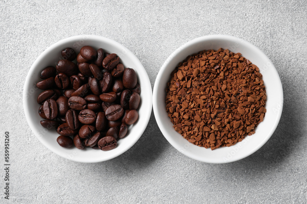 Fototapeta premium Bowls with roasted beans and instant coffee on light grey table, flat lay