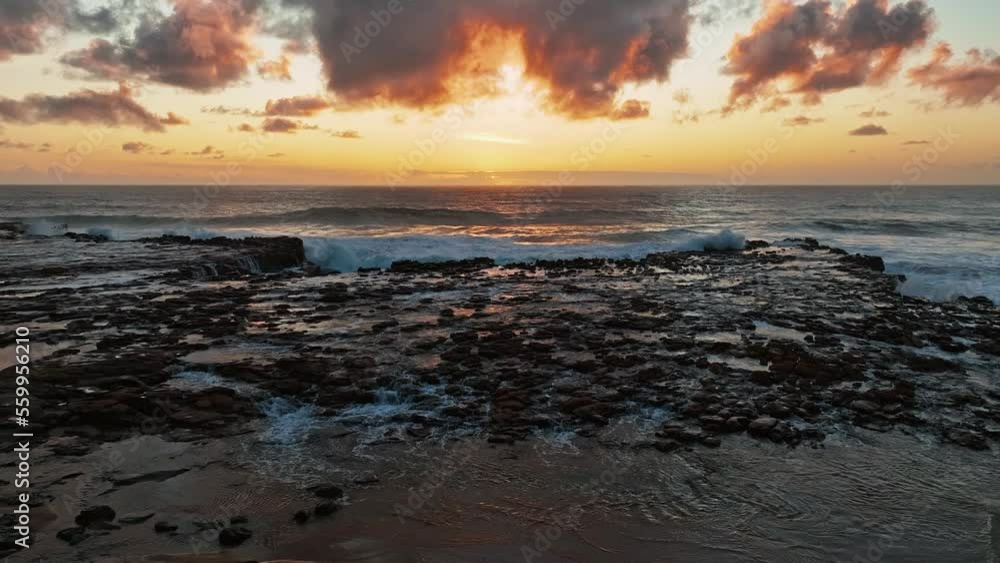 Surfs up sunrise at the seaside with scattered clouds at North Avoca, Central Coast, NSW, Australia. Surfs up sunrise at the seaside with scattered clouds at North Avoca, Central Coast, NSW, Australia.