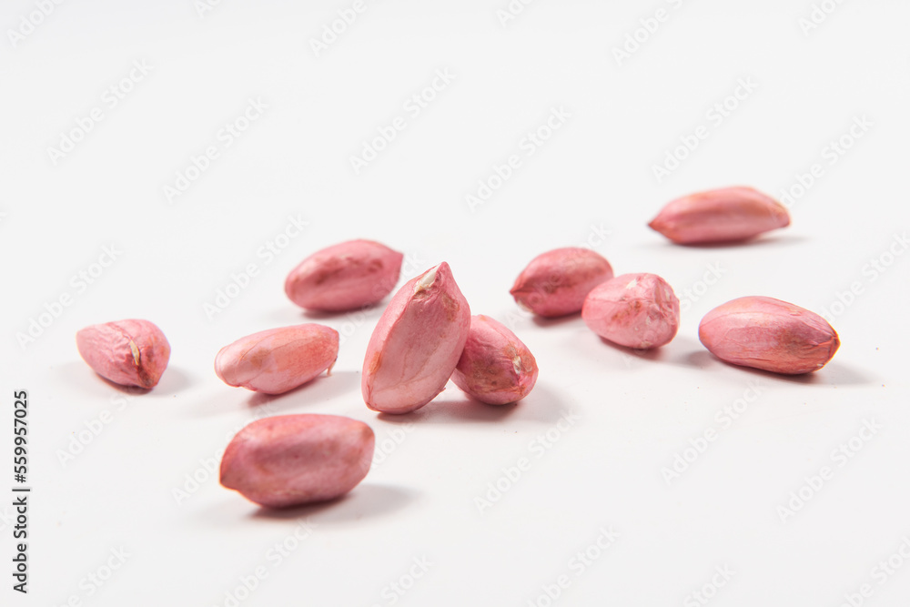 Raw peanuts seeds isolated on white background. Raw peanuts seeds isolated on white background.