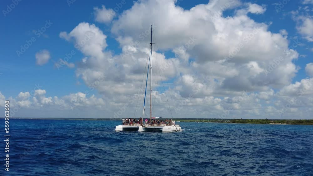 Sailing catamaran heading toward Saona Island Sailing catamaran heading toward Saona Island