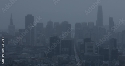 San Francisco, California, USA - January 2, 2023: Heavy rain falls on the downtown skyline of San Francisco.