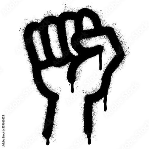 Spray Painted Graffiti fist hand icon Sprayed isolated with a white background. graffiti fist power symbol with over spray in black over white.