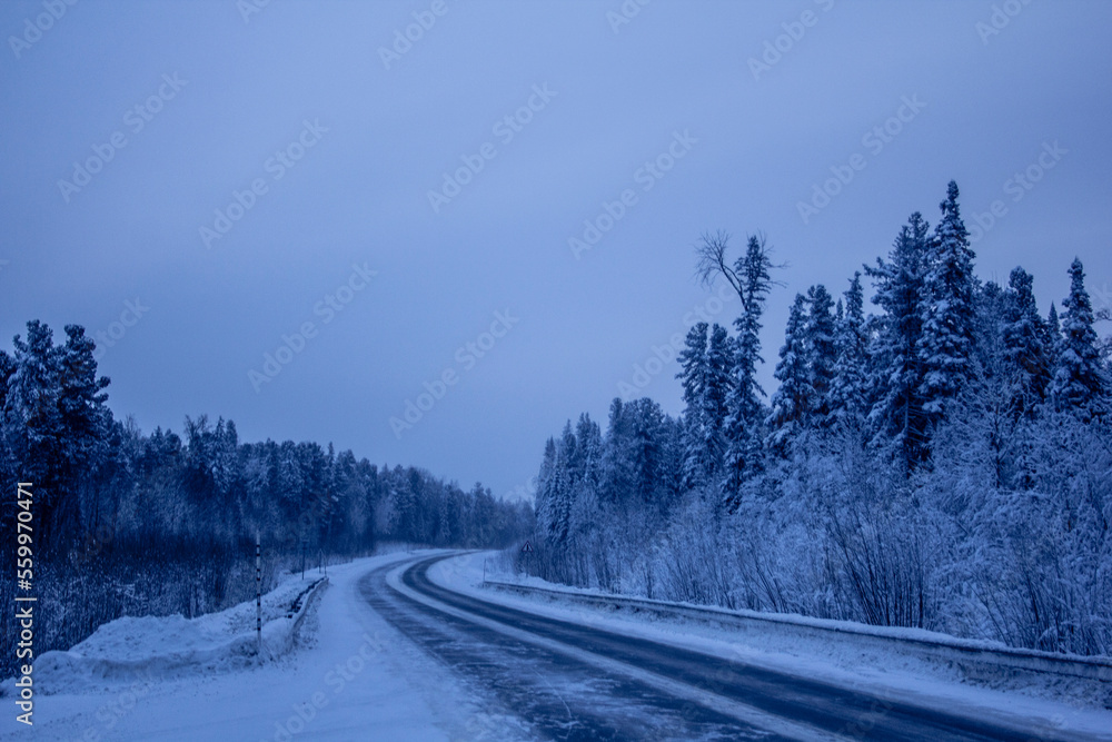 Winter road from Khanty-Mansiysk to Nyagan city of Khanty-Mansiysk Autonomous Okrug - Yugra. Winter road from Khanty-Mansiysk to Nyagan city of Khanty-Mansiysk Autonomous Okrug - Yugra.