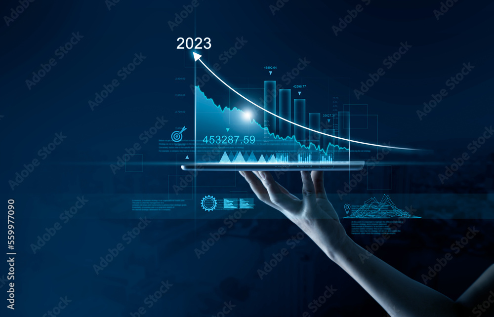 Business man holding tablet with showing growth planning, opportunity, challenge and business strategy graphs and target of business gain profits in 2023, New goal, Plan and visions for next year. - obrazy, fototapety, plakaty 