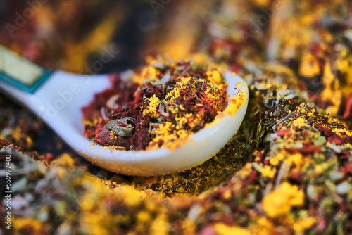 Photography Spices in a spoon close-up.