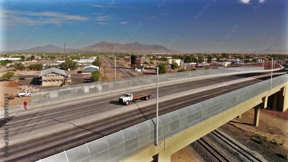 Low angle drone flight parallel to and crossing the Hwy 347 bridge in Maricopa Arizona. Low angle drone flight parallel to and crossing the Hwy 347 bridge in Maricopa Arizona.