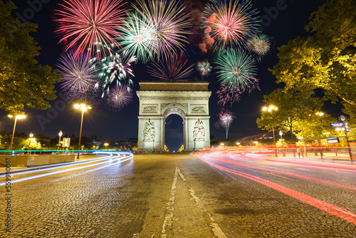 Arc De Triomphe with fireworks during New Year celebration in Paris. France