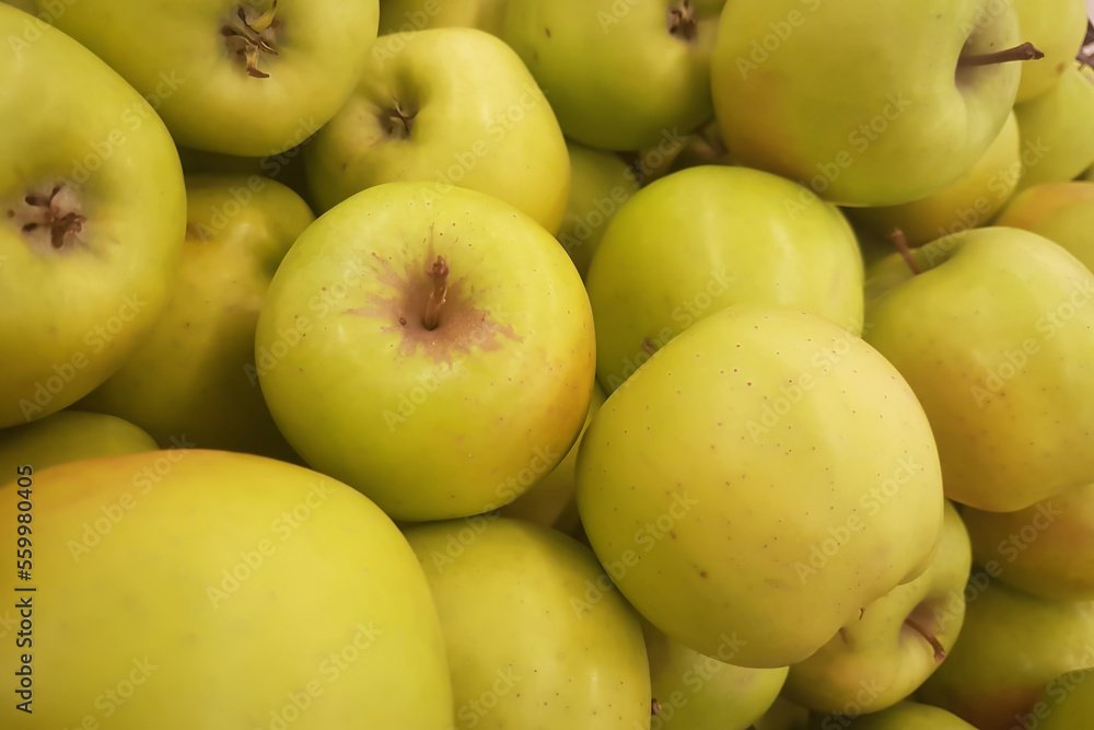 fresh green apples on the counter in the supermarket fresh green apples on the counter in the supermarket