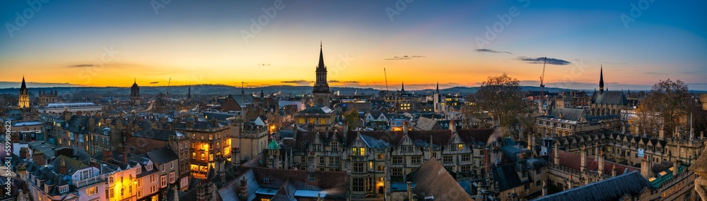 Oxford city aerial rooftop skyline at sunset. England