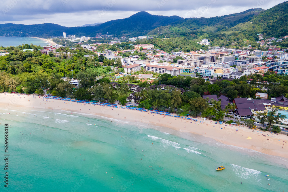 Aerial tropical landscape of Kata Beach and Andaman sea. Drone view over the coastline of Phuket city, a famous travel destination in the South of Thailand.
