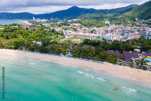 Aerial tropical landscape of Kata Beach and Andaman sea. Drone view over the coastline of Phuket city, a famous travel destination in the South of Thailand. © Summer Paradive
