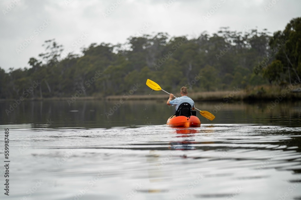 canoeing and kayaking on a river in Australia - obrazy, fototapety, plakaty 