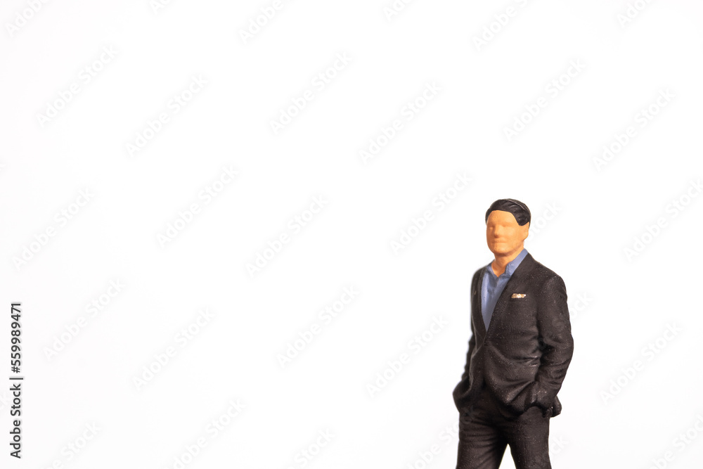 Miniature people, Businessman on white background And space for text