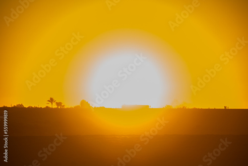 Sun set on magic lake surrounded by desert at Fayoum  sun set  shot
