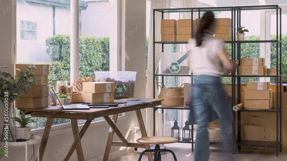 Time lapse asia ecommerce home office of Net zero waste Go green vendor online shop small store. Smart seller SME owner young woman asian people busy packing order work in eco friendly packaging box. Time lapse asia ecommerce home office of Net zero waste Go green vendor online shop small store. Smart seller SME owner young woman asian people busy packing order work in eco friendly packaging box.