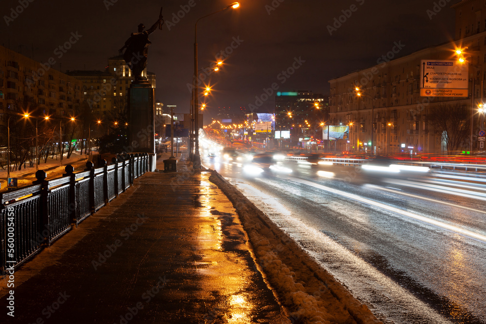 Light traces of traffic at Victory bridge, Moscow on winter night