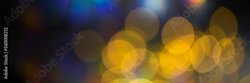 Beautiful abstract background with golden bokeh for Festive, Christmas and party design web banner.