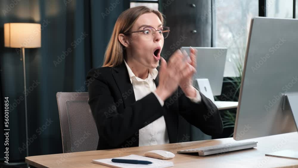 custom made wallpaper toronto digitalOverjoyed happy businesswoman in glasses winner looking at pc computer excited by great professional work result success, motivated office worker receive good news online win opportunity get promoted.