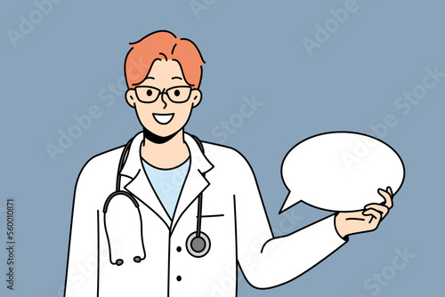 Smiling young doctor in medical uniform hold empty speech bubble. Happy medical worker with mockup talk balloon share message. Vector illustration. 