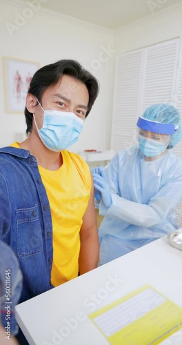man takes selfie when vaccination photo
