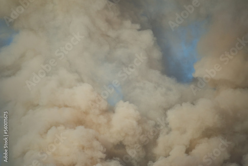 Large clouds of smoke against the sky.