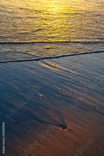 sunset at coast of the sea photo