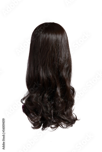 Close-up shot of a women's black wig. Female long black straight hair with curls is isolated on a white background. Back view.