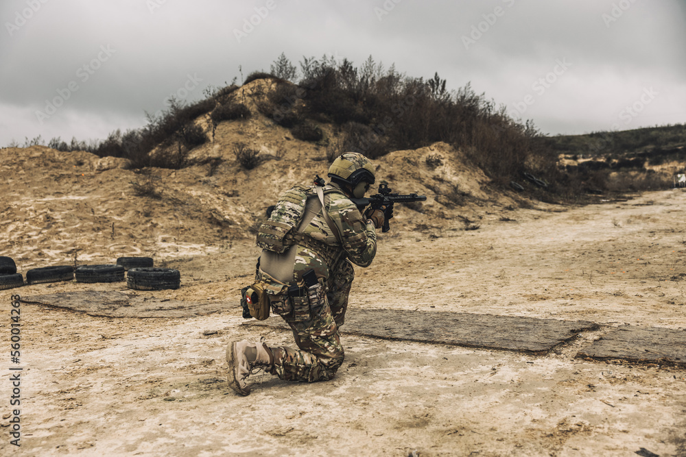 Fototapeta premium Sniper with rifle on a position