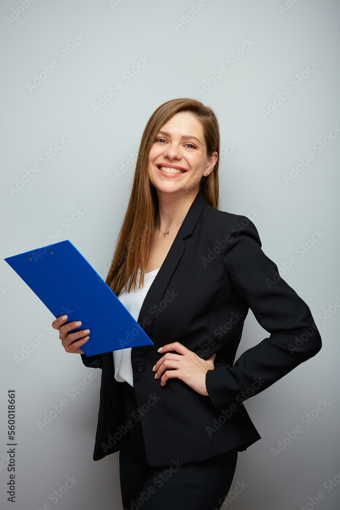 Smiling school teacher woman or adult student with book. Isolated business lady portrait with black suit. Smiling school teacher woman or adult student with book. Isolated business lady portrait with black suit.