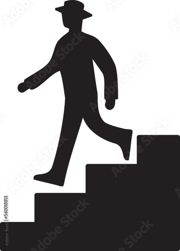 階段を下りる男性のシルエット