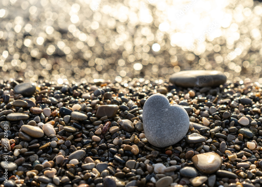 Stone Heart on Pebble Beach, Shining Ocean Water, Rocky Shore Love Symbole, Summer Pebble Heart Stone Heart on Pebble Beach, Shining Ocean Water, Rocky Shore Love Symbole, Summer Pebble Heart