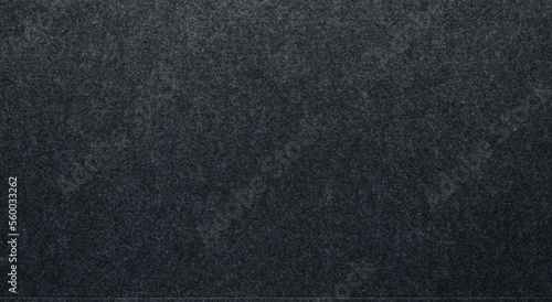 Black or gray felt or flannel fabric texture can be use as background