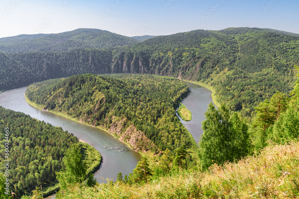 Awesome view of scenic river among evergreen woods Awesome view of scenic river among evergreen woods