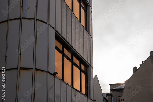 Detail of modernistic building - headquarters of "Katowice Miasto Ogrodow" cultural institution. Rounded corner and facade made of white, steel panels.