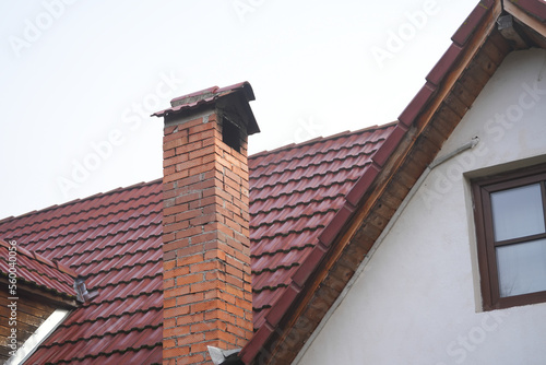 brick chimney at a house in the mountainous countryside. detail.