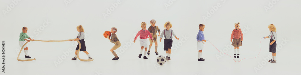Horizontal banner with images of happy children in retro style clothes playing together, having fun isolated over grey background. Football, basketball, ropes Horizontal banner with images of happy children in retro style clothes playing together, having fun isolated over grey background. Football, basketball, ropes