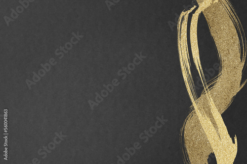 黒い紙に金色の絵具で描いた背景素材