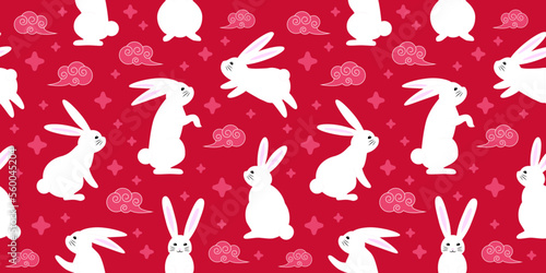 Seamless red pattern with zodiacal rabbits in the sky, seamless pattern for Chinese New Year, 2023 Year of the Rabbit, pattern for gifts covers, backgrounds, invitations.