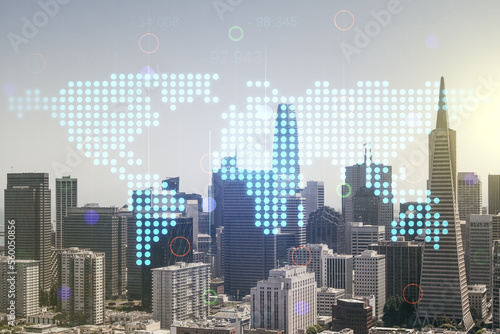 Double exposure of abstract digital world map hologram on San Francisco office buildings background, big data and blockchain concept
