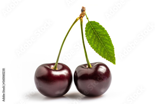 Sweet cherries with cherry leaf isolated on a white background.