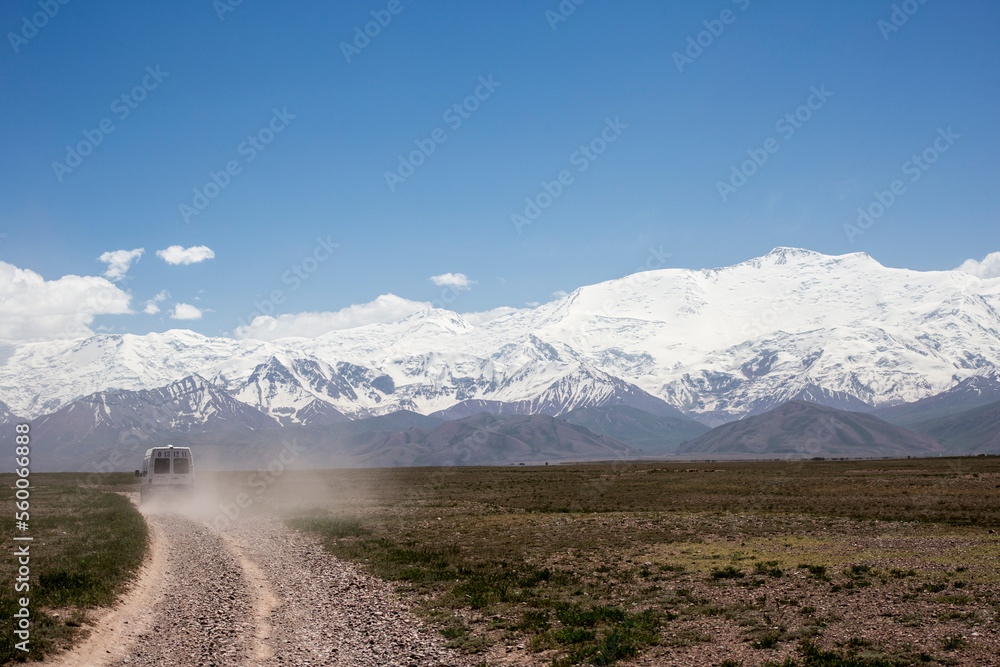 A truck drives to Lenin Peak basecamp A truck drives to Lenin Peak basecamp