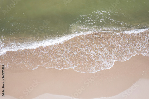 aerial view of an stunning beautiful sea beach with water waves