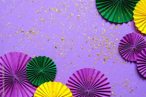 Mardi gras.Holidays mardi gras masquarade, venetian mask fan over purple background. view above,mardi gras background copy space Happy Mardi Gras . Fat Tuesday carnival texture golden,green purple