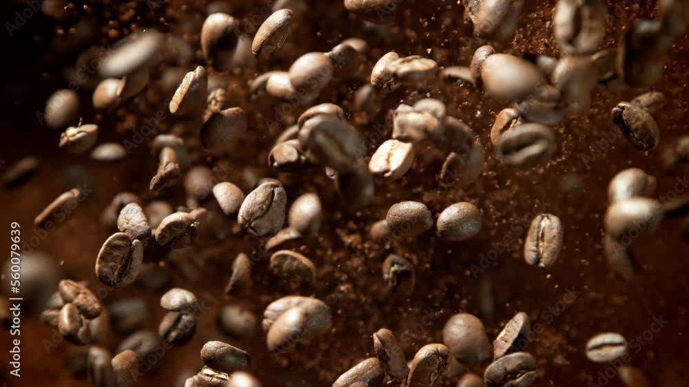 Super Slow Motion Shot of Ground Coffee and Fresh Beans Explosion Towards Camera at 1000fps. Super Slow Motion Shot of Ground Coffee and Fresh Beans Explosion Towards Camera at 1000fps.