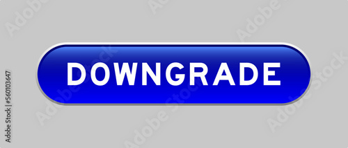 Blue color capsule shape button with word downgrade on gray background