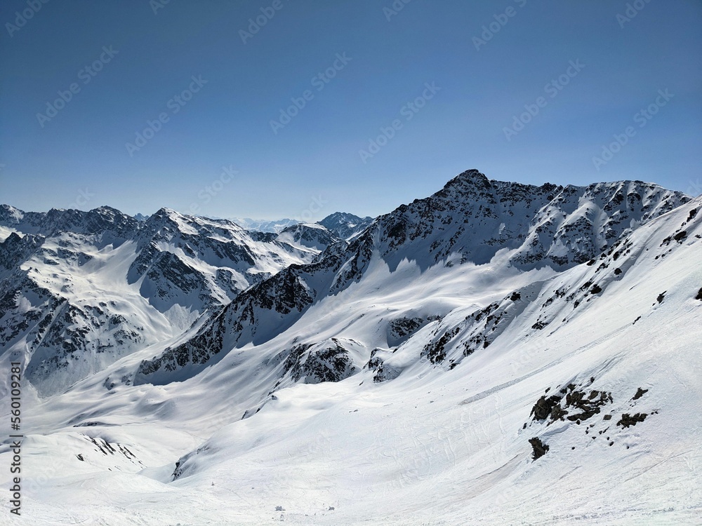 Mountain panorama on the Pischahorn above Davos Mountains. Beautiful mountain landscape with snowy mountain peaks